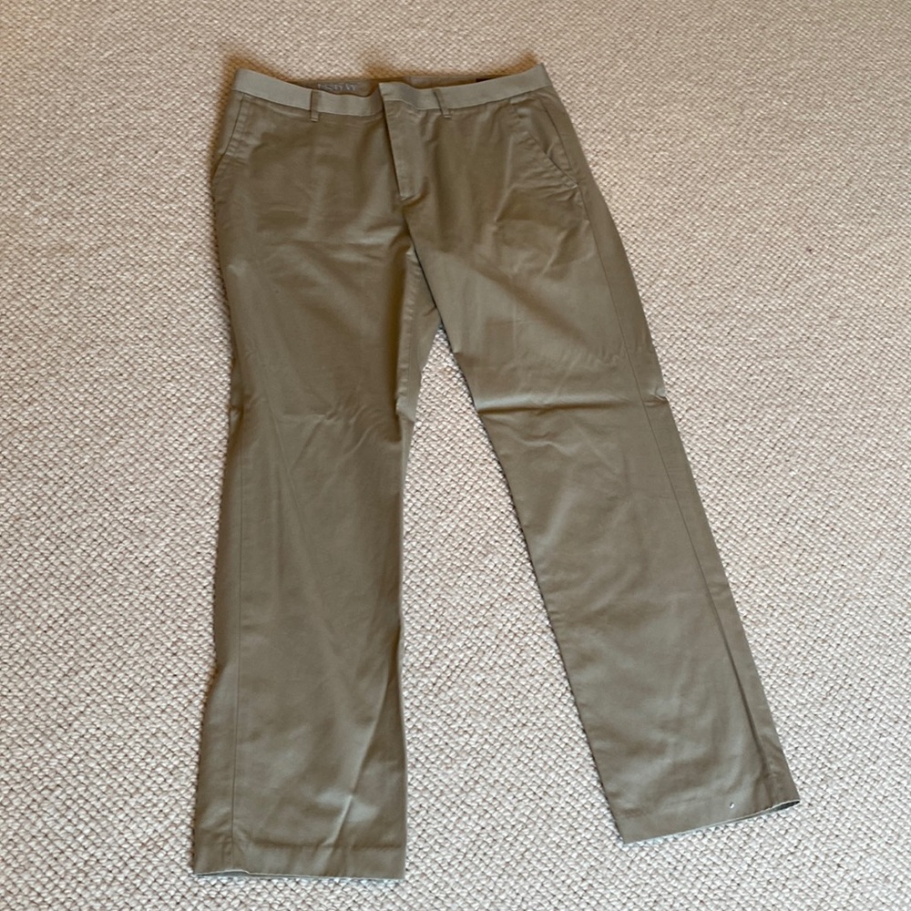 Tan Bonobos men dress pants.
